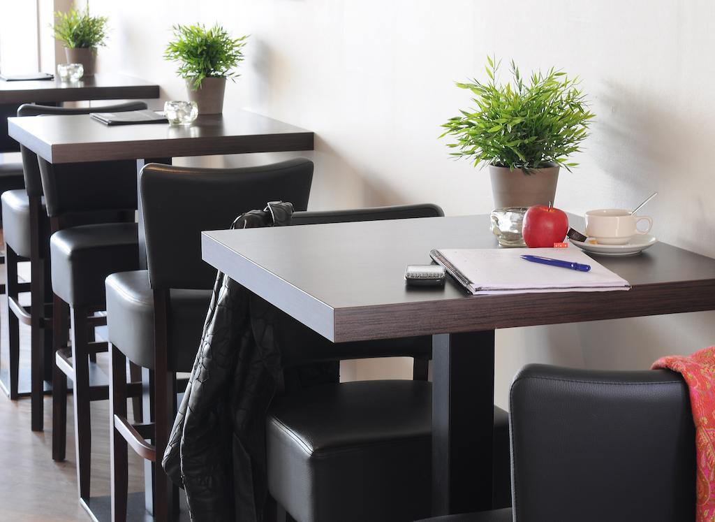 Hotel Brussels خروت بيغاردن المطعم الصورة